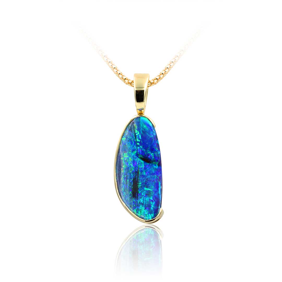 Freeform Boulder Opal Pendant featuring blue and Green colours in 18k