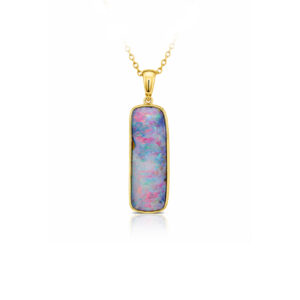 This handcrafted Australian boulder opal pendant showcases a captivating freeform opal with a delicate play of soft blue and pink colour, creating an elegant, painterly effect. Expertly set in 14k yellow gold, this one-of-a-kind pendant highlights the natural beauty and individuality of Australian boulder opal. A timeless addition to any fine opal jewellery collection.