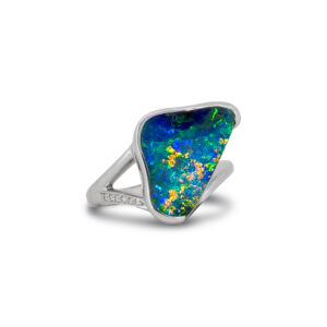 This gem-grade boulder opal ring reveals vivid blue, green and golden play of colour with exceptional brilliance, beautifully presented in a contemporary 18k white gold design. A striking Australian boulder opal ring that celebrates the individuality of every opal.