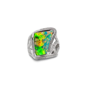 Electric green fire takes centre stage in this gem-grade Australian boulder opal, illuminated by vibrant flashes of gold, blue and pink. Beautifully presented in an 18k white gold setting with diamond accents. A striking celebration of the unique beauty found in every Australian boulder opal.