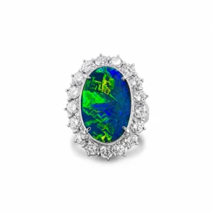 Gem-Grade Lightning Ridge black opal ring with an exceptional broad flash with striking electric green and royal blue setting in 18k white gold with diamonds